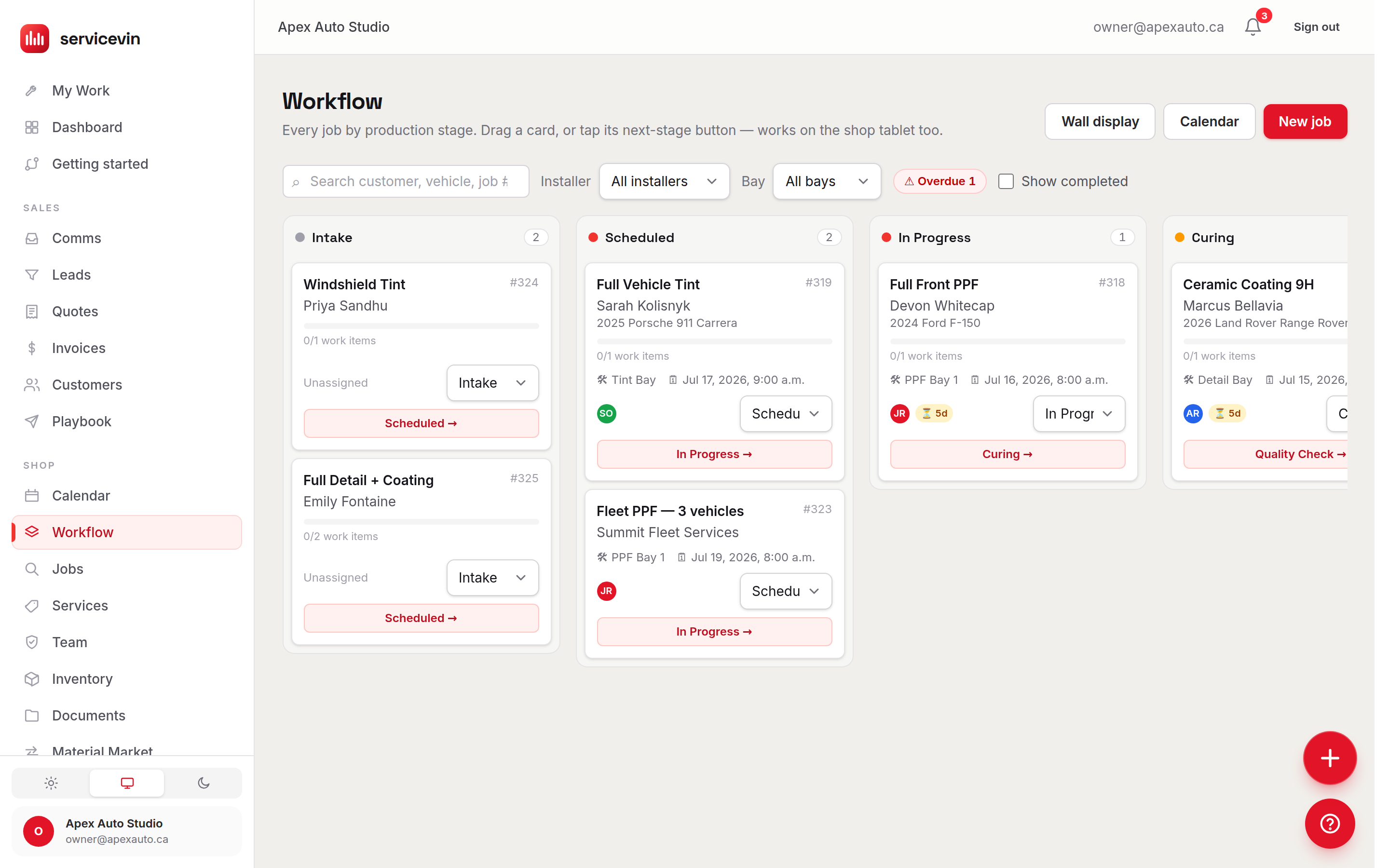 The workflow board: job cards moving through Intake, Scheduled, In Progress and Curing, each with its bay and installer